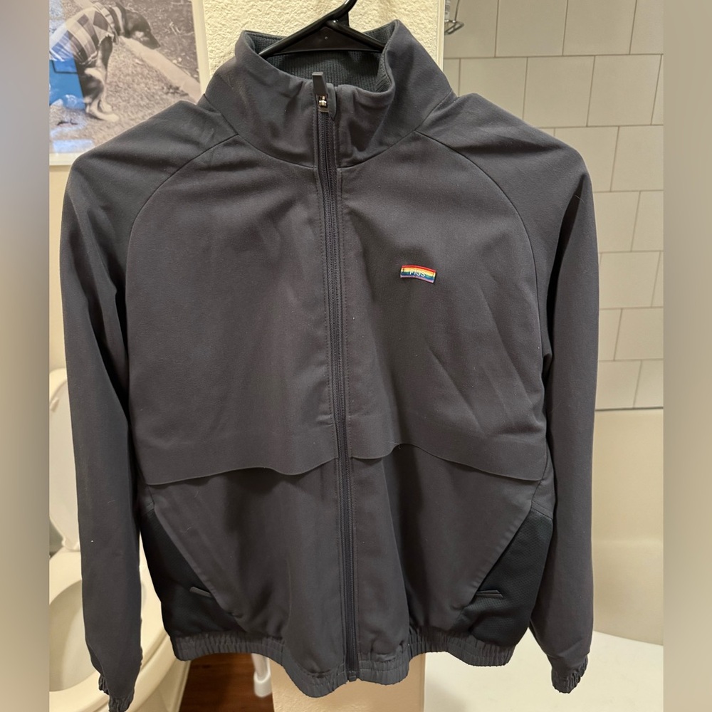 Figs Women's Utility Jacket in Black with Small Multicolor Logo